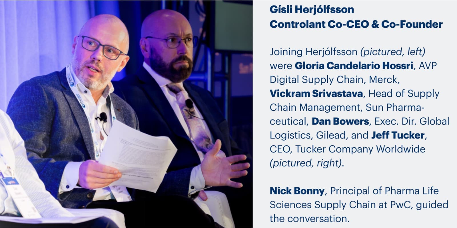 Gísli Herjólfsson speaking on a conference panel, beside a card listing the other panelists